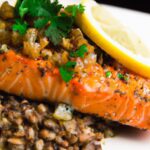 Savor Grilled Salmon with Herb Crust and Lentil Ragout