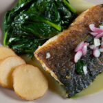 Crispy Pan-Seared Trout Meets Garlic Sautéed Spinach Delight